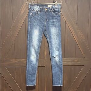 Blue Skinny Jeans with Distressed Details